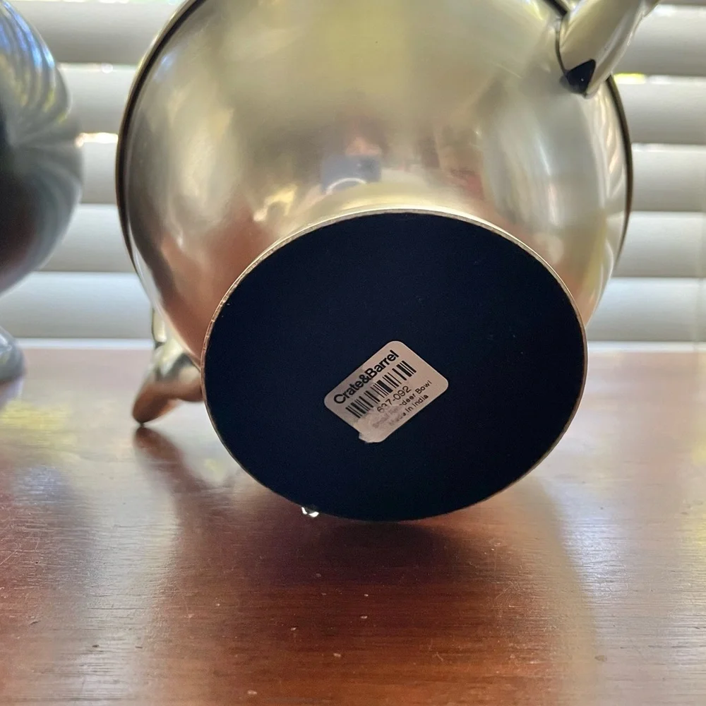 Pair of Crate&Barrel modern reindeer holiday stainless steel footed bowls, 6”
